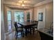 Breakfast nook with bay window overlooking the backyard at 4401 Riverlake Way, Snellville, GA 30039