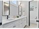 Bathroom boasts double sinks, granite countertop and a stylish modern design at 660 Timm Valley Ne Rd, Atlanta, GA 30305