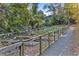 Community garden with raised beds and lush greenery, accessible by a gravel pathway at 660 Timm Valley Ne Rd, Atlanta, GA 30305