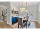 Charming dining room with a bar area, hardwood floors, and stylish pendant lighting at 660 Timm Valley Ne Rd, Atlanta, GA 30305