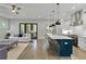 Open-concept kitchen with a large center island, stainless steel appliances, and hardwood floors at 660 Timm Valley Ne Rd, Atlanta, GA 30305