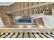 Aerial view of a modern staircase with wood steps and decorative iron railings at 660 Timm Valley Ne Rd, Atlanta, GA 30305