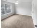 Cozy bedroom featuring carpet, ample natural light, and a closet at 5132 Silhouette Sw Ln, Mableton, GA 30126