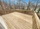 Wooden deck with a sturdy railing, an excellent spot for outdoor entertaining or relaxing at 5132 Silhouette Sw Ln, Mableton, GA 30126