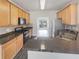 Kitchen with stainless steel appliances, wooden cabinets, and granite countertops at 5132 Silhouette Sw Ln, Mableton, GA 30126