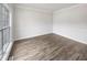 Bright living room featuring hardwood floors and natural light at 5132 Silhouette Sw Ln, Mableton, GA 30126