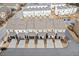 Aerial view of townhomes with garages and covered patios in a suburban setting at 3374 Grey St, Duluth, GA 30096