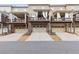 Exterior view of townhomes with private covered patios and attached garages at 3374 Grey St, Duluth, GA 30096