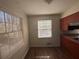 Dining Area featuring large windows and natural light at 5080 Springtree Ct, Lithonia, GA 30038