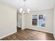 Dining room featuring modern lighting and new flooring, great for entertaining guests at 428 Rainey Rd, Temple, GA 30179