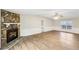 Inviting living area with a stone fireplace, new flooring, and ample natural light at 428 Rainey Rd, Temple, GA 30179