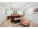 Spacious bedroom featuring light wood floors and recessed lighting at 4450 Sandalwood Way, Cumming, GA 30041