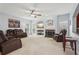 Spacious living room features a fireplace, recessed lighting, a ceiling fan, and neutral-toned walls at 4450 Sandalwood Way, Cumming, GA 30041