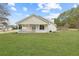 Cozy house with a covered porch and a chimney at 110 Oak Wood Ln, Covington, GA 30016