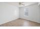 Bright bedroom featuring a large window and wood-look floors at 110 Oak Wood Ln, Covington, GA 30016