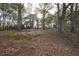 Large wooded lot, partially cleared, and covered in leaves, great opportunity to build your dream home at 2096 Old Jackson Rd, Locust Grove, GA 30248