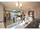 Dining area showcasing an open floor plan to the kitchen at 2096 Old Jackson Rd, Locust Grove, GA 30248