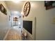 Hallway leading to a mudroom with washer and dryer and decorative wall decor at 2096 Old Jackson Rd, Locust Grove, GA 30248