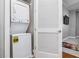 Convenient in-unit laundry room with stackable washer and dryer, offering space-saving functionality at 2300 Peachford Rd # 1410, Atlanta, GA 30338