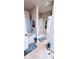 Bright bathroom features a bathtub, a glass shower, and themed decorations at 11700 Brightside Pkwy, Hampton, GA 30228