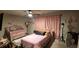 Charming bedroom features a cozy single bed and a cute, adjacent crib at 11700 Brightside Pkwy, Hampton, GA 30228