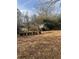 Lush backyard with a storage shed and planting area for gardening at 502 Turner Ave, Palmetto, GA 30268