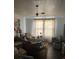 Comfortable living room with a large sofa, accent chair, and neutral curtains needing TLC at 502 Turner Ave, Palmetto, GA 30268