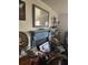 Living room featuring a fireplace mantel and a large mirror, along with decorations at 502 Turner Ave, Palmetto, GA 30268