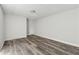 Basement featuring neutral walls and new gray floors at 5368 Stafford Nw Dr, Lilburn, GA 30047