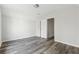 Bedroom boasts new grey floors and neutral walls at 5368 Stafford Nw Dr, Lilburn, GA 30047