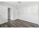 Bedroom boasts new grey floors and neutral walls at 5368 Stafford Nw Dr, Lilburn, GA 30047