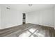 Bedroom with new floors, neutral paint and ensuite bathroom at 5368 Stafford Nw Dr, Lilburn, GA 30047
