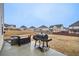 Spacious backyard featuring a grill, perfect for outdoor cooking and gatherings at 938 Blue Juniper Cir, Loganville, GA 30052