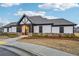 Community clubhouse featuring a modern design with stone accents and well-maintained landscaping at 938 Blue Juniper Cir, Loganville, GA 30052