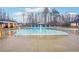 Sparkling community pool features mushroom fountains and ample lounging space for residents to enjoy at 938 Blue Juniper Cir, Loganville, GA 30052