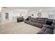 Expansive recreation room featuring an entertainment area and a game area at 938 Blue Juniper Cir, Loganville, GA 30052