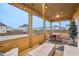 Cozy screened-in porch with outdoor seating area, perfect for relaxing and entertaining at 938 Blue Juniper Cir, Loganville, GA 30052