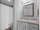 Bathroom features a shower/tub combo, vanity with marble countertops, and new fixtures at 199 14Th Ne St # 2010, Atlanta, GA 30309