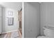 Neutral-toned full bathroom featuring walk-in shower, ceramic tiled floors, and gray painted walls at 199 14Th Ne St # 2010, Atlanta, GA 30309