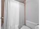 Bathroom features a shower/tub combo with clean white shower curtain and new fixtures at 199 14Th Ne St # 2010, Atlanta, GA 30309