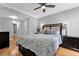 Bedroom features a king-size bed, hardwood floors, and natural light at 199 14Th Ne St # 2010, Atlanta, GA 30309