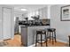 This kitchen features stainless steel appliances and a breakfast bar at 199 14Th Ne St # 2010, Atlanta, GA 30309