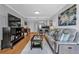 This living room features hardwood floors and a grey sofa at 199 14Th Ne St # 2010, Atlanta, GA 30309