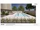 The pool is surrounded by lounge seating and lush greenery, creating a luxurious and relaxing outdoor retreat at 199 14Th Ne St # 2010, Atlanta, GA 30309