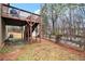 Backyard view, deck with stairs, and a fenced perimeter at 2656 Muskeg Sw Ct, Atlanta, GA 30331