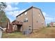 Exterior view showcasing back of home with deck at 2656 Muskeg Sw Ct, Atlanta, GA 30331