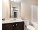 Cozy bathroom showcases a single sink vanity and a shower-tub combo at 2656 Muskeg Sw Ct, Atlanta, GA 30331
