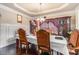 Formal dining room featuring hardwood floors and ornate furnishings at 2656 Muskeg Sw Ct, Atlanta, GA 30331