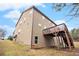 Back exterior view of home with deck and stair access at 2656 Muskeg Sw Ct, Atlanta, GA 30331