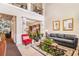 Elegant living room with soaring ceilings, neutral walls, and a comfortable seating area at 2656 Muskeg Sw Ct, Atlanta, GA 30331